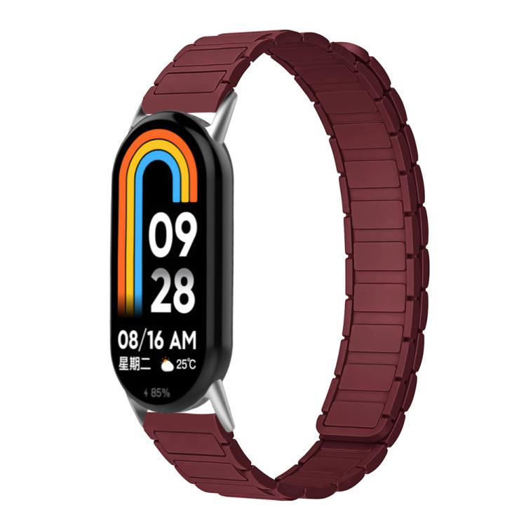 Wine red silicone watch band shown on a smart band.