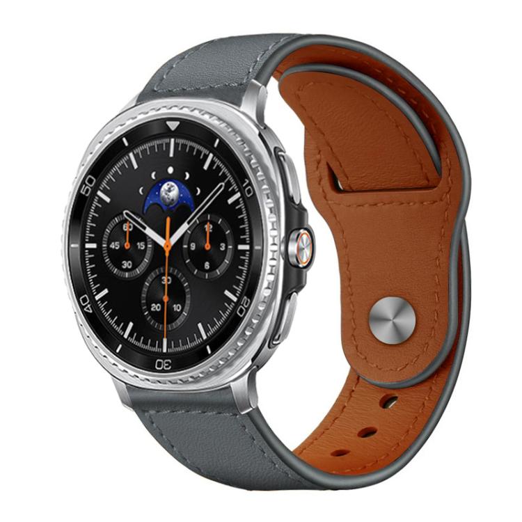 Gray leather watch band with brown lining and a metal snap stud