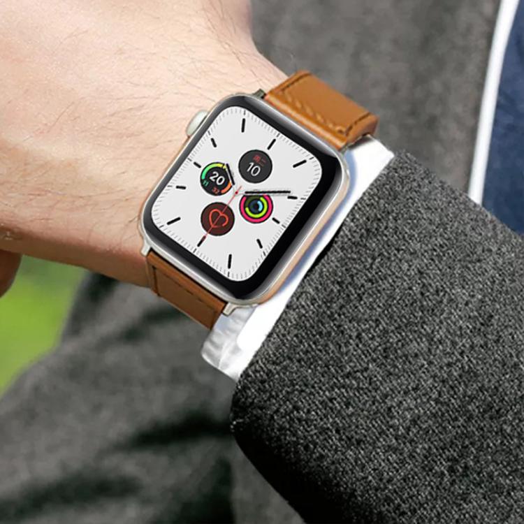 xDfind tan leather watch band with a silver smartwatch, worn on the wrist