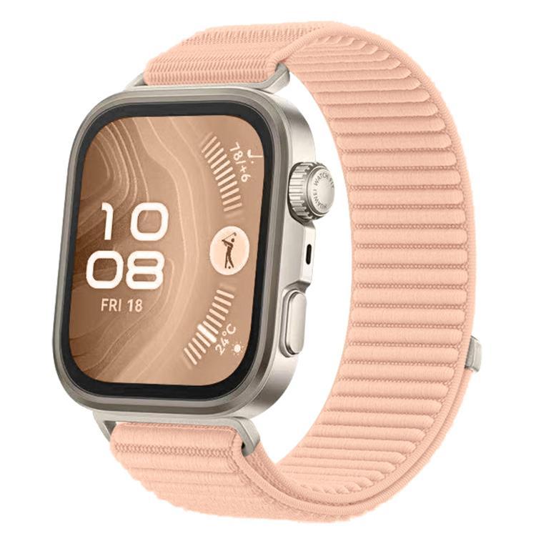 Woven nylon watch band in pale pink with a silver smartwatch