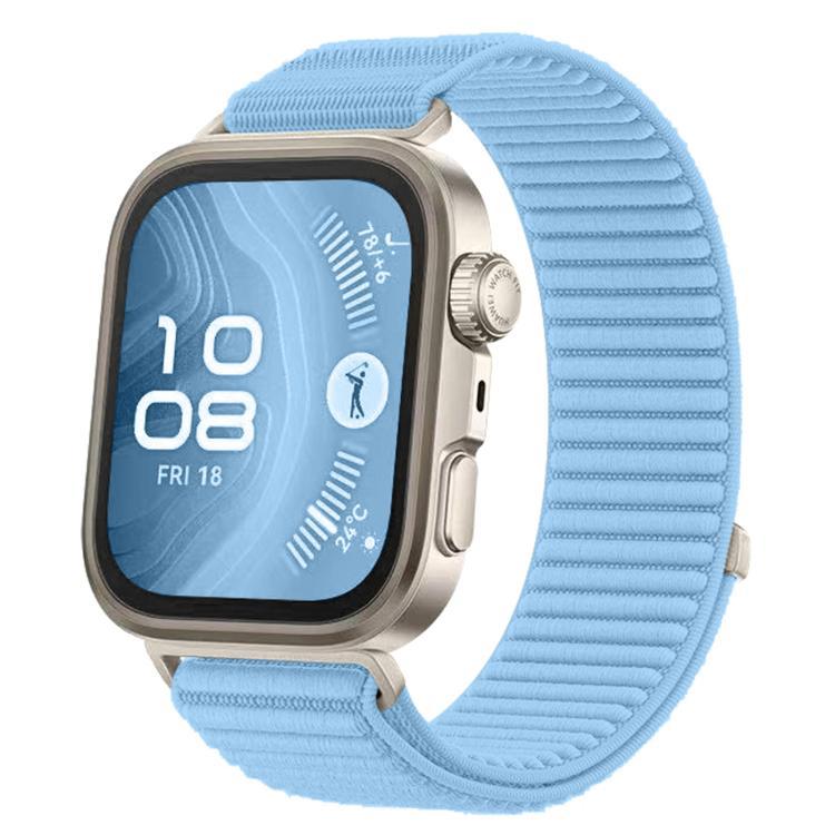 Woven nylon watch band in light blue with a silver smartwatch