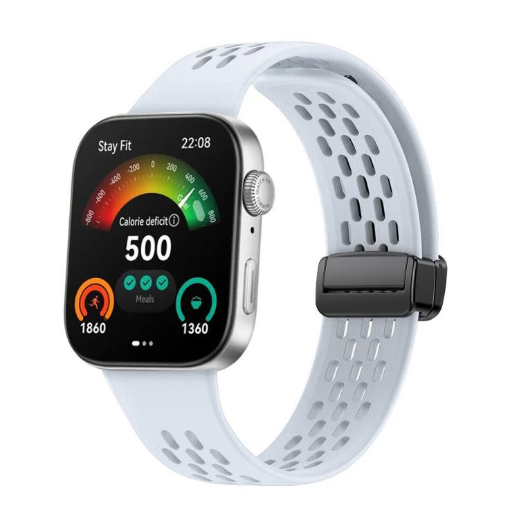Light blue perforated silicone watch band with a black magnetic buckle, attached to a smartwatch