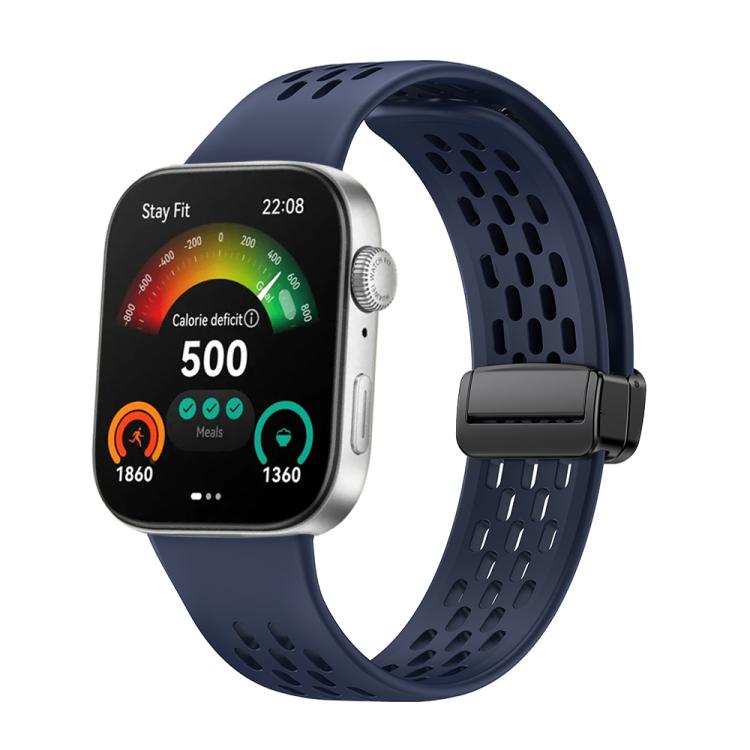 Midnight blue perforated silicone watch band with a black magnetic buckle, attached to a smartwatch