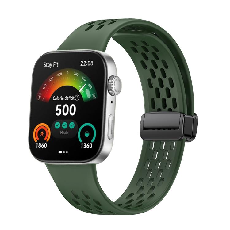 Dark green perforated silicone watch band with black magnetic clasp on a smartwatch