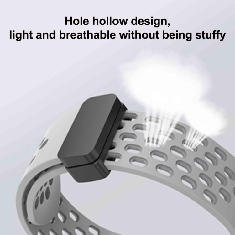 Light gray perforated silicone watch band with a black clasp