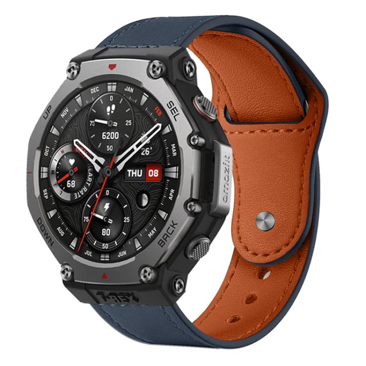 Leather watch band with dark blue exterior, orange-brown lining, and rivet buckle
