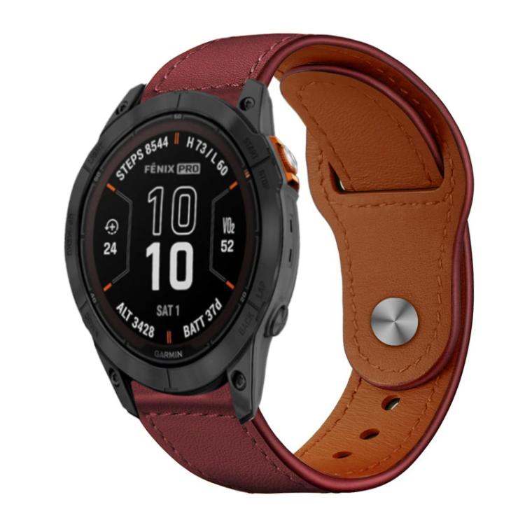 Leather watch band with burgundy outer panels, tan lining, stitching, and a metal rivet buckle