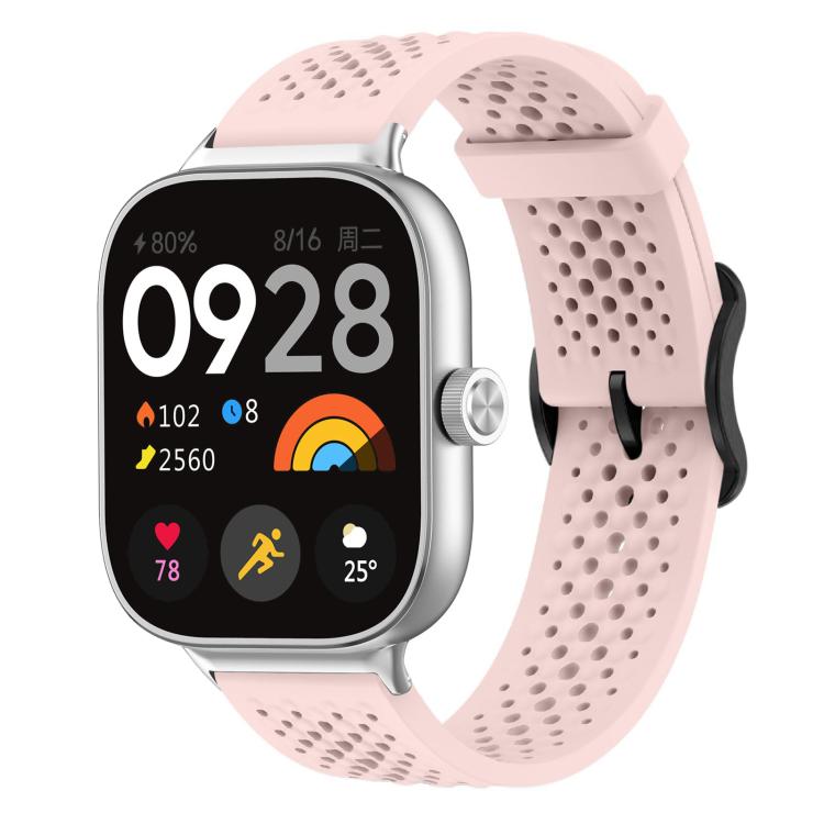 Pale pink perforated silicone watch band with silver smartwatch
