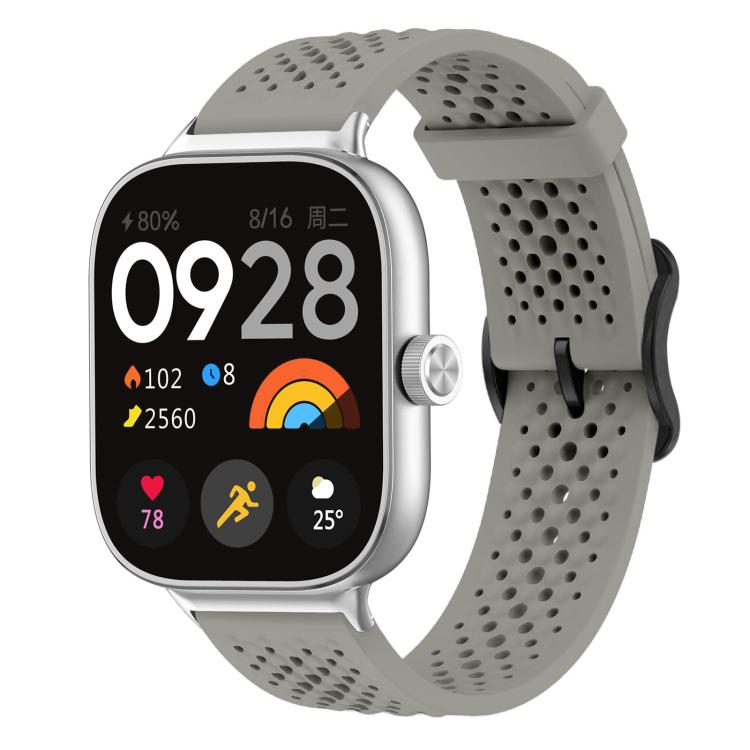 Gray perforated silicone watch band with silver smartwatch