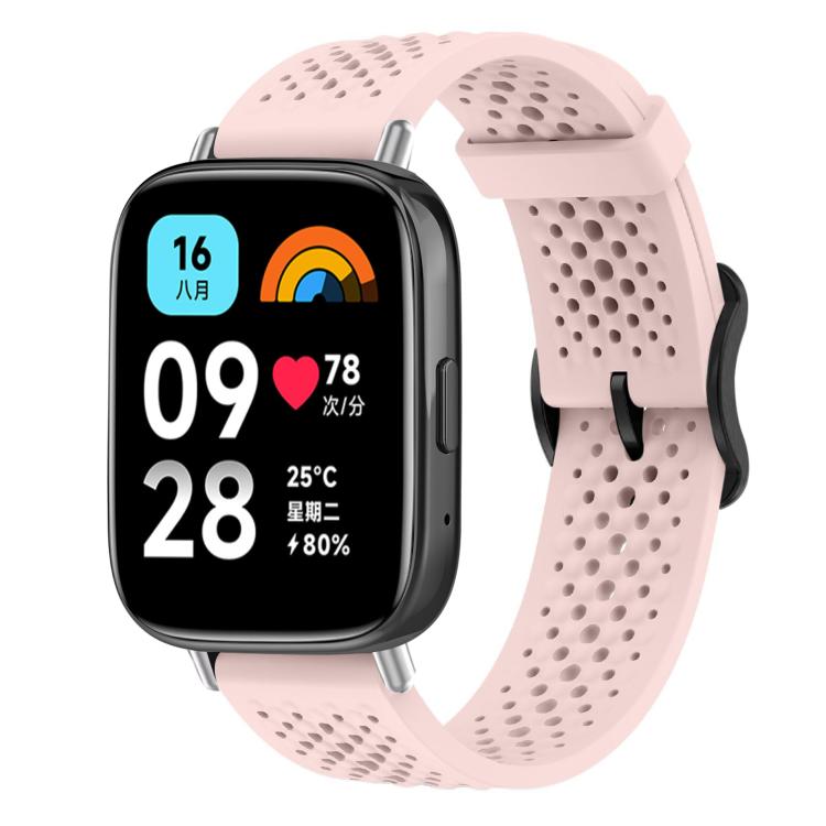 Pink perforated silicone smartwatch band shown fitted to a rectangular smartwatch