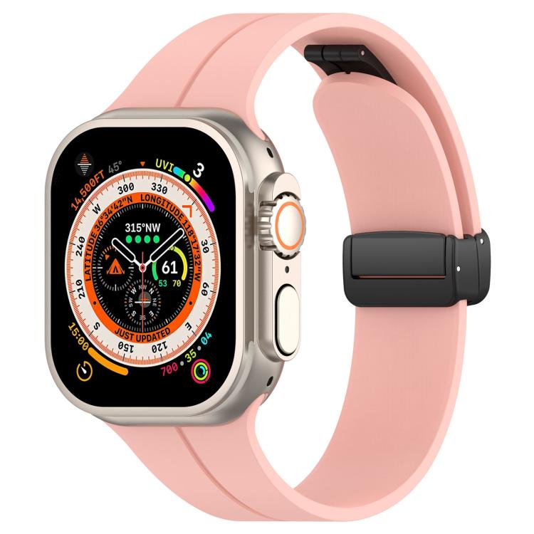 xDfind light pink silicone Apple Watch band with black folding buckle, shown on a watch