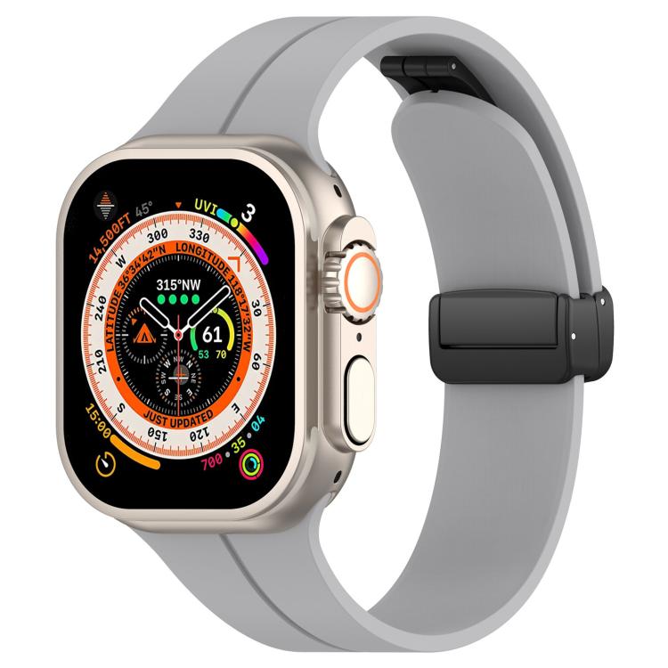 xDfind light gray silicone Apple Watch band with black folding buckle, shown on a watch