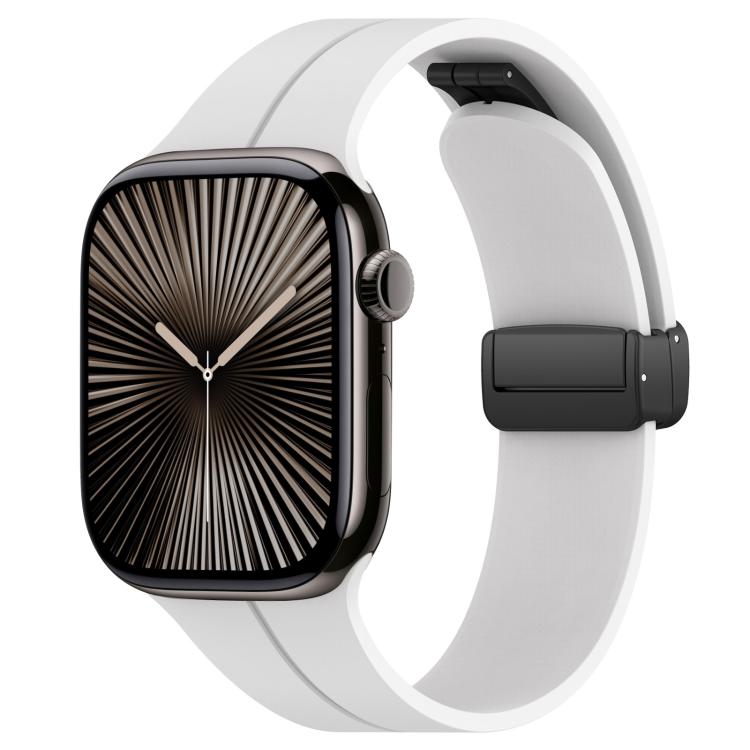 White silicone watch band with black folding buckle, shown on an Apple Watch