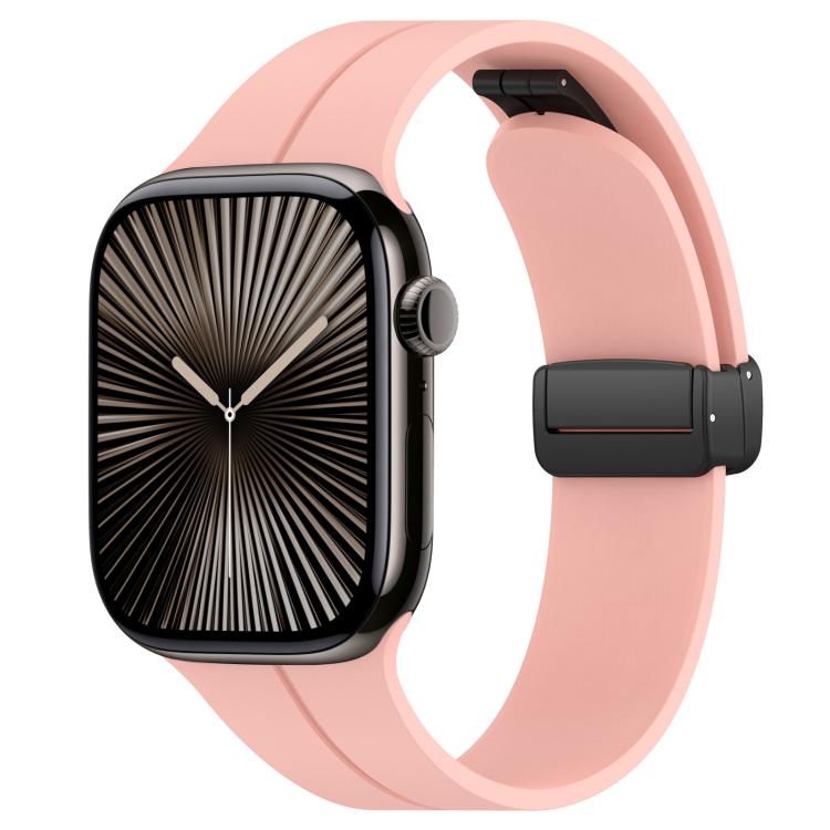 Light pink silicone watch band with black folding buckle, shown on an Apple Watch