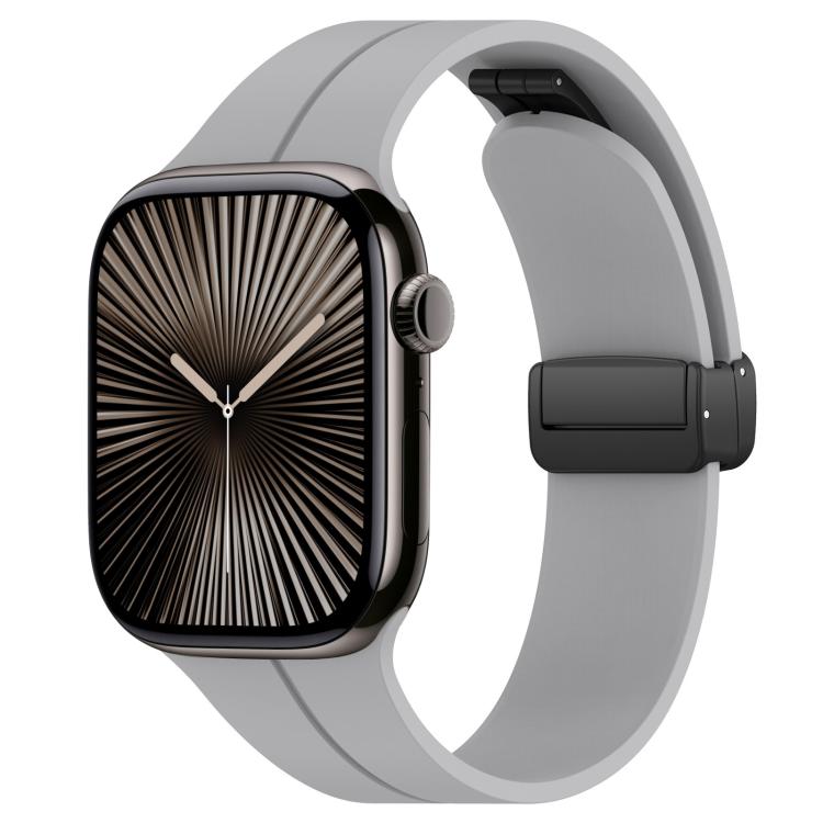 Light gray silicone watch band with black folding buckle, shown on an Apple Watch