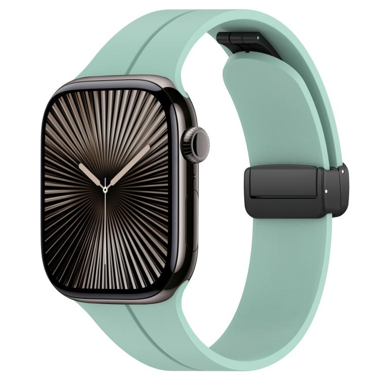 xDfind mint silicone Apple Watch band with black folding buckle, shown on a watch
