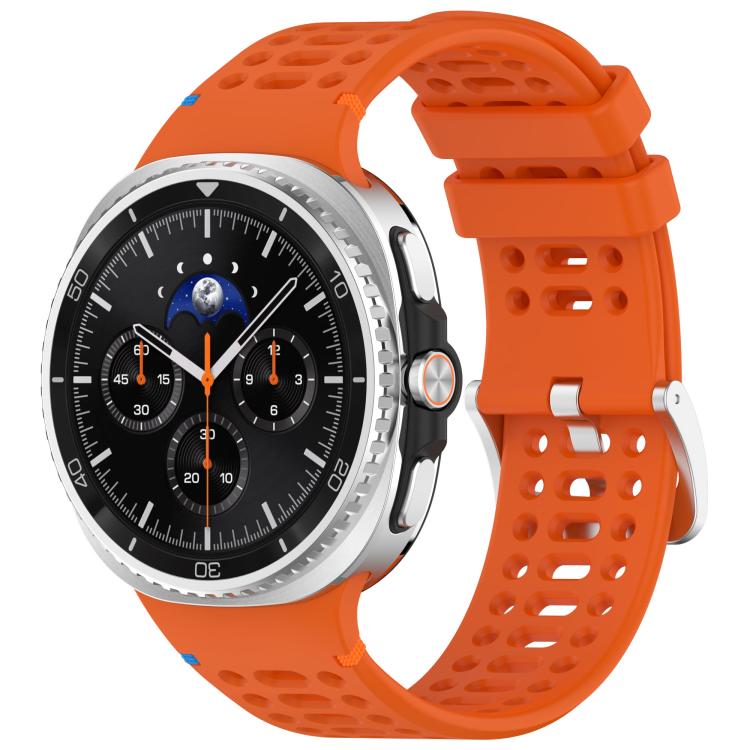 Orange breathable silicone watch band with silver buckle, shown attached to a smartwatch.