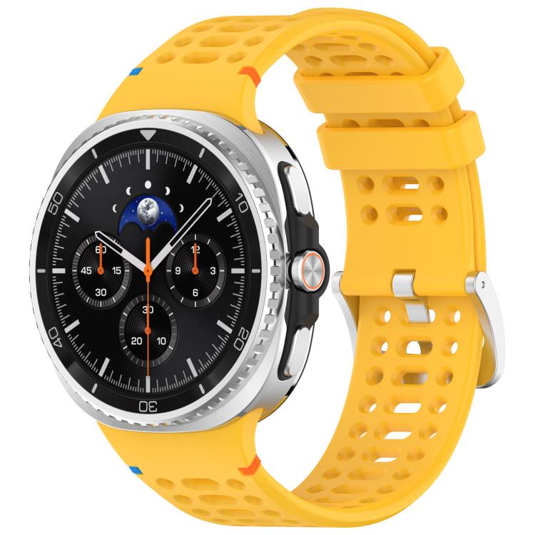 Yellow perforated silicone watch band with silver buckle, shown on a silver smartwatch