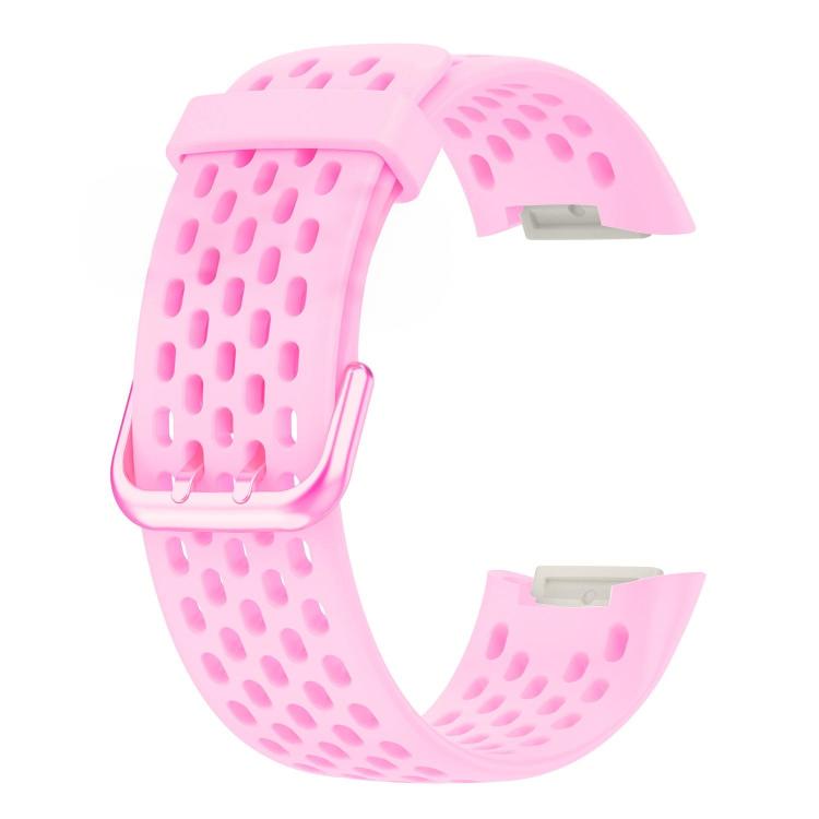 Pink perforated silicone watch band for Fitbit Charge 6/5, shown without tracker