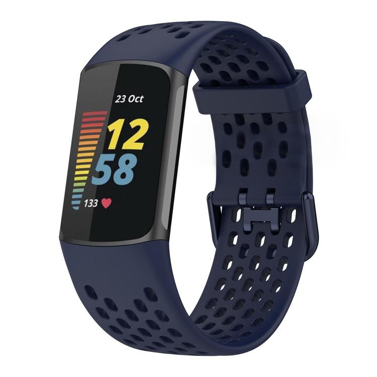 Navy perforated silicone watch band fitted to a Fitbit Charge 6/5 tracker
