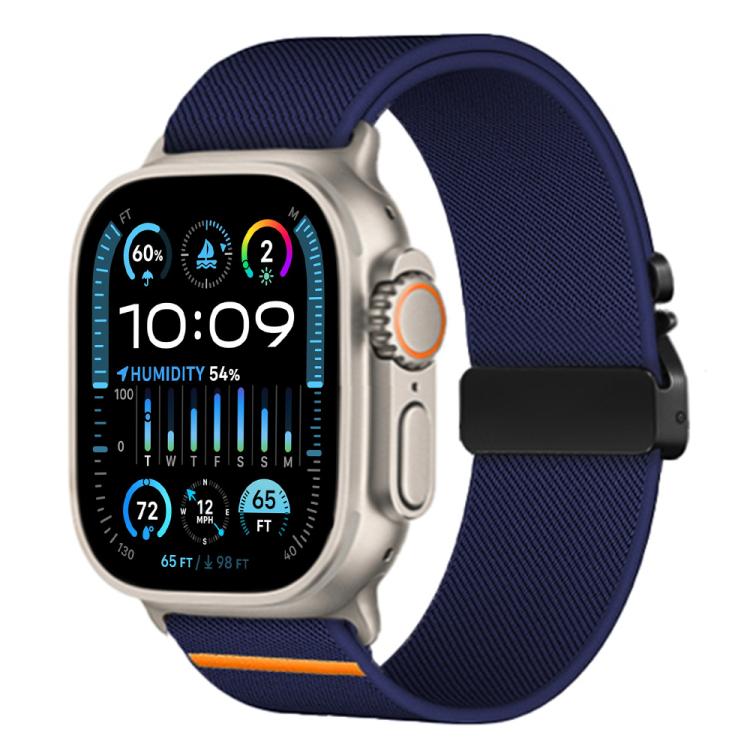 Apple Watch with a dark navy stretch nylon band, black buckle, and orange accent stripe