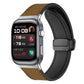 Light brown silicone watch band with stitched panels and magnetic buckle, shown on a smartwatch.