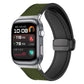 Army green silicone watch band with stitched panels and magnetic buckle, shown on a smartwatch.