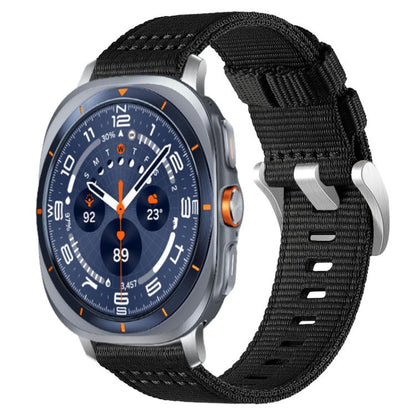 Black two-section nylon watch band with metal hooks, shown on a silver smartwatch