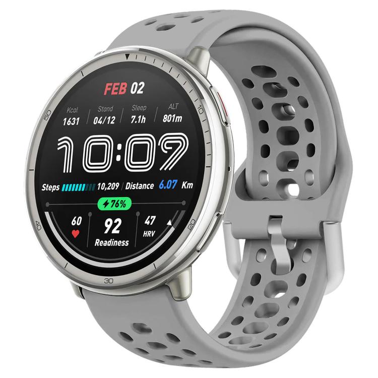 Gray perforated silicone sport watch band fitted to a silver smartwatch