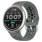 Gray perforated silicone sport watch band with silver buckle, fitted to a round watch