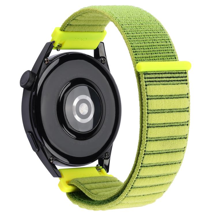 Back view of xDfind lime green ribbed nylon watch band on a black watch