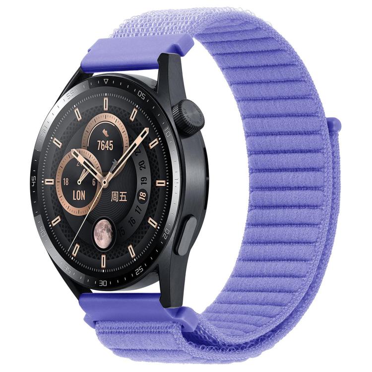 Blue-purple xDfind ribbed nylon hook-and-loop watch band on a black watch