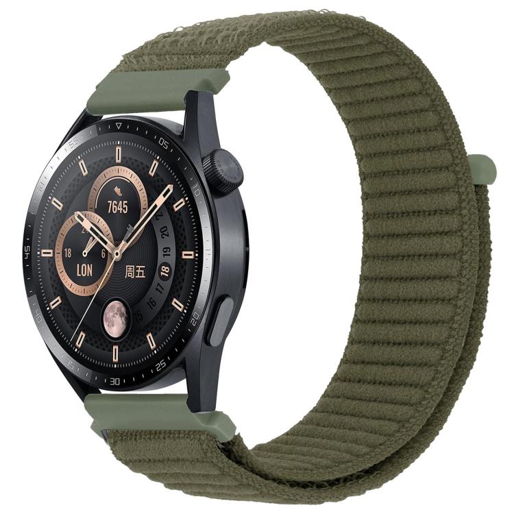 xDfind olive green ribbed nylon watch band with hook-and-loop closure on a black watch