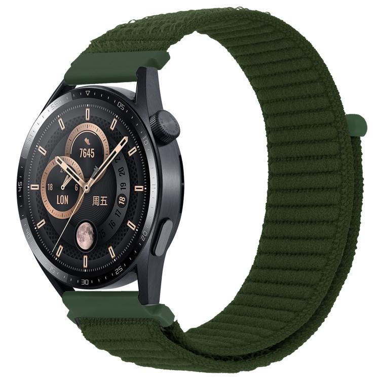 xDfind dark green ribbed nylon watch band with hook-and-loop closure on a black watch