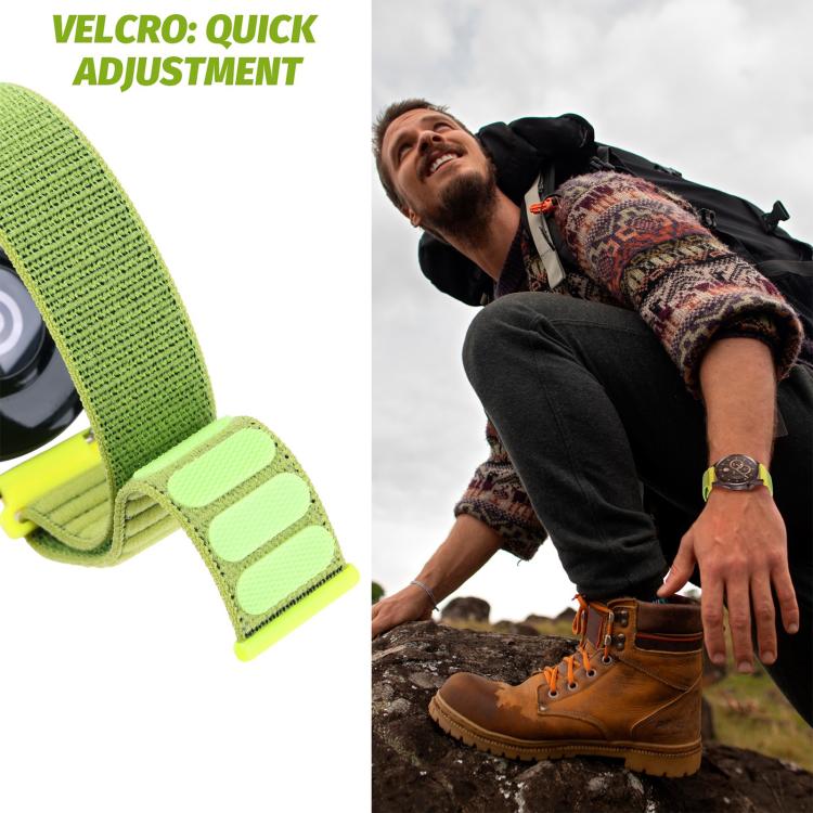 Green xDfind nylon watch band with hook-and-loop closure, shown close up and worn