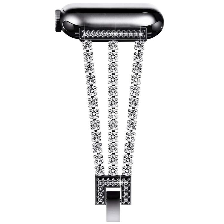 Three-row rhinestone metal Apple Watch band attached to a watch, shown from the side