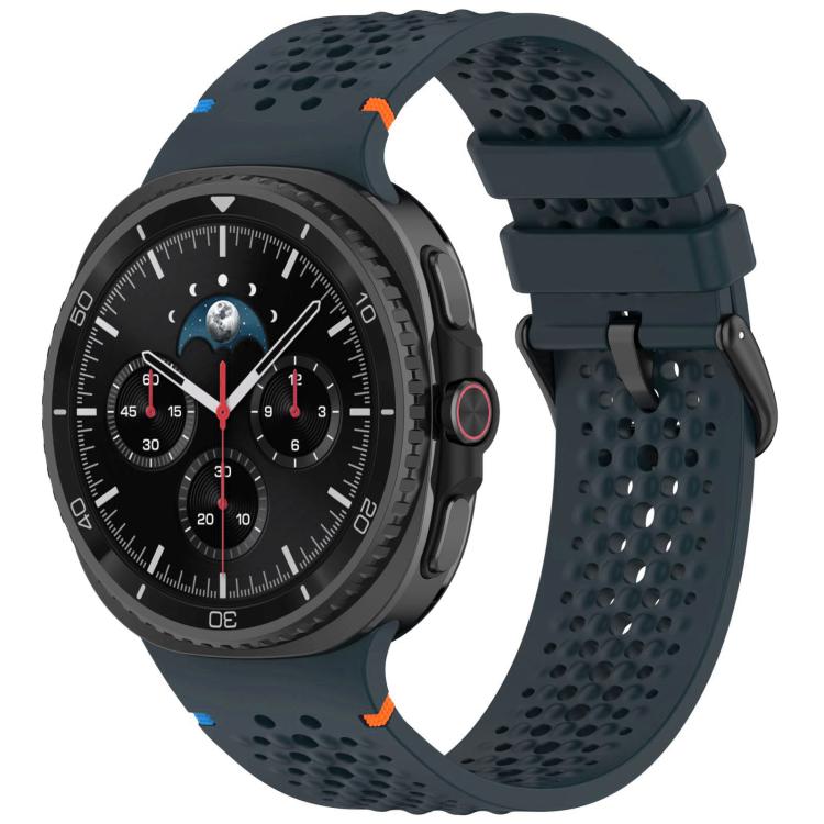 Dark blue perforated silicone watch band with black buckle on a smartwatch
