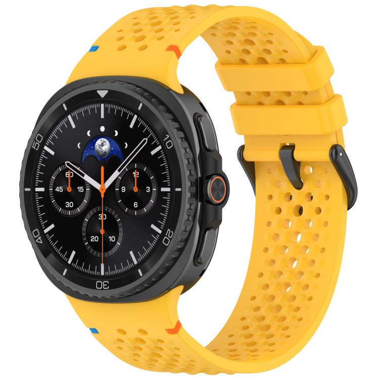 Yellow perforated silicone watch band with black buckle, shown fitted to a black smartwatch.
