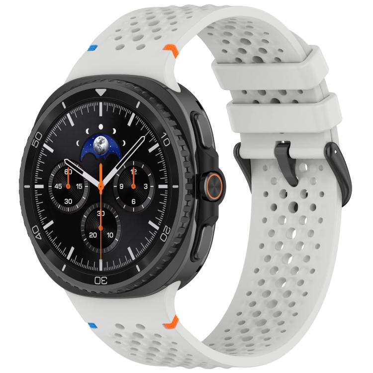 White perforated silicone watch band with black buckle, shown on a smartwatch.