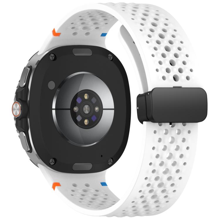 Reverse view of white perforated silicone watch band with black magnetic buckle