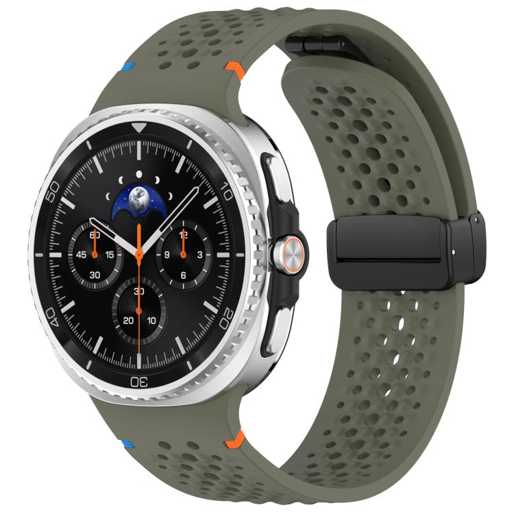 Olive green perforated silicone watch band with black magnetic buckle, shown on a Galaxy watch.
