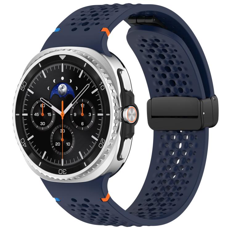 Navy perforated silicone watch band with black magnetic buckle, shown on a Galaxy watch.