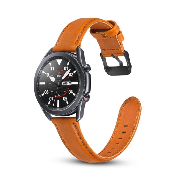 Orange leather watch strap with buckle and perforations, angled front view