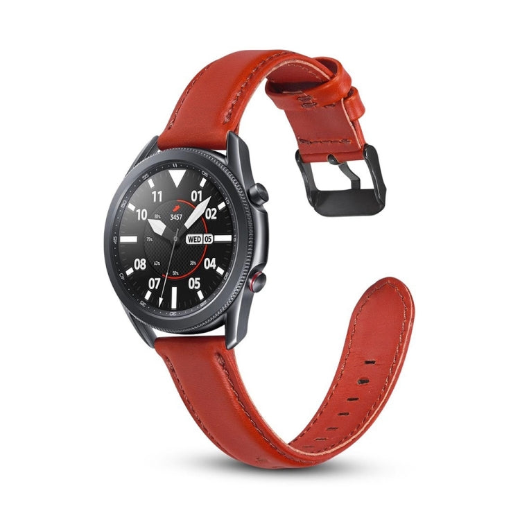 Red leather watch strap with buckle and perforations, front view