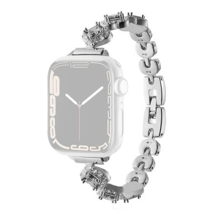 Silver metal Apple Watch band with crystal four-leaf clover links and watch