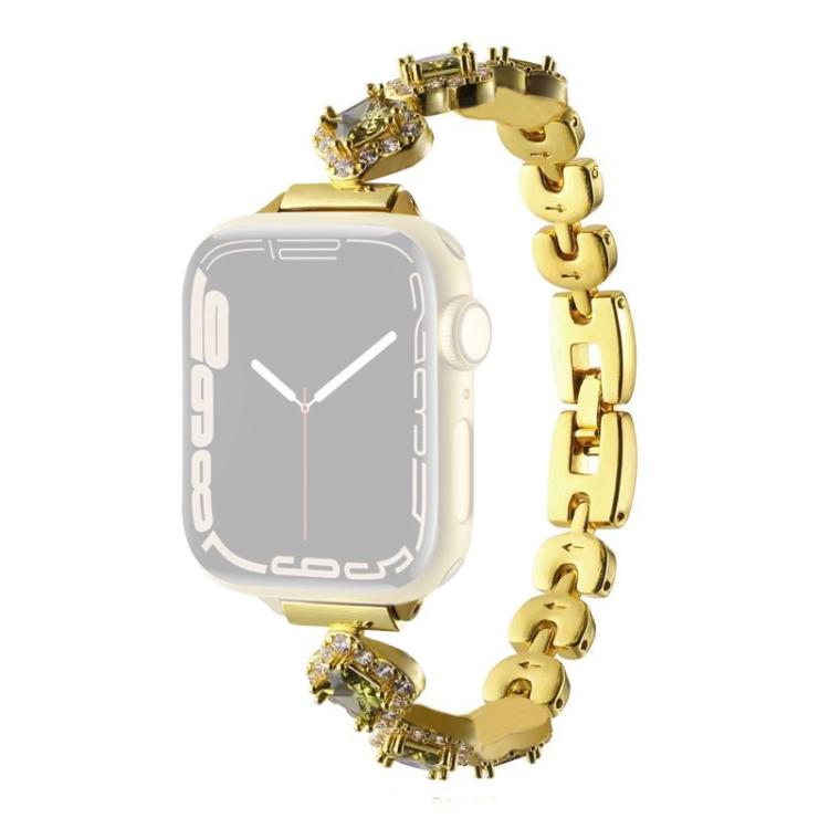 Gold metal Apple Watch band with crystal four-leaf clover links and watch