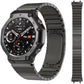 Dark gray stainless steel link watch band shown fitted to a rugged smartwatch and detached.