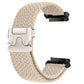 Cream braided watch band with light-colored snap buckle