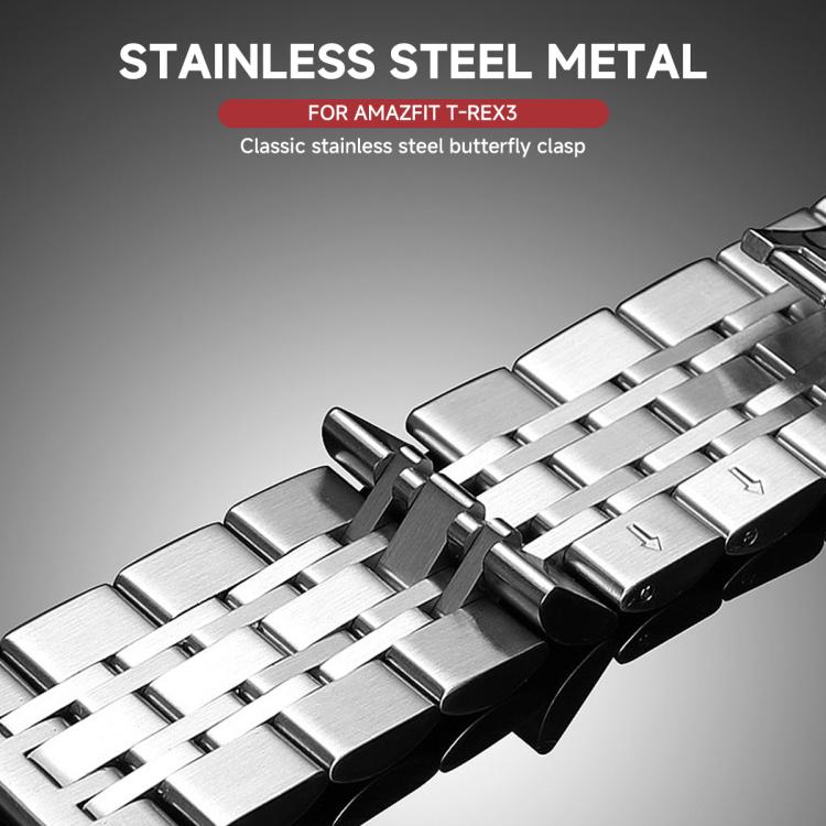 Silver stainless steel watch band close-up showing the butterfly clasp and linked design