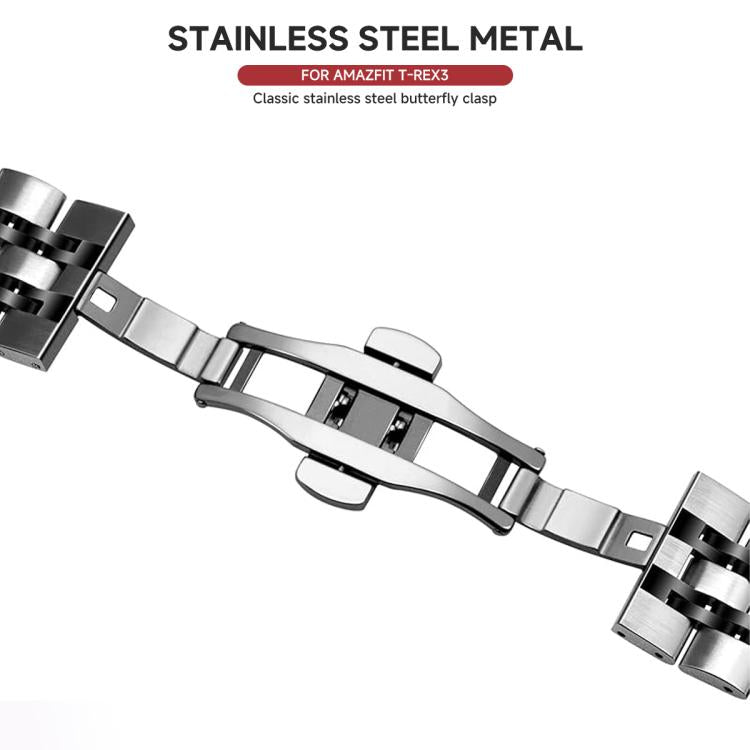 Silver and black stainless steel watch band showing its open butterfly clasp